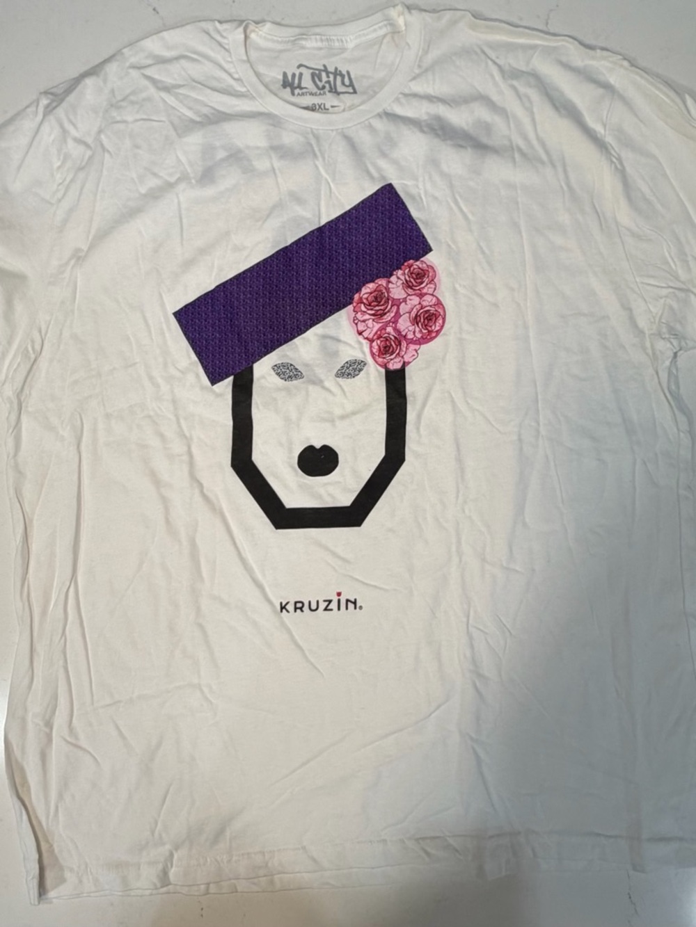 White Graphic Tee with Purple Hat & Pink Floral Accent